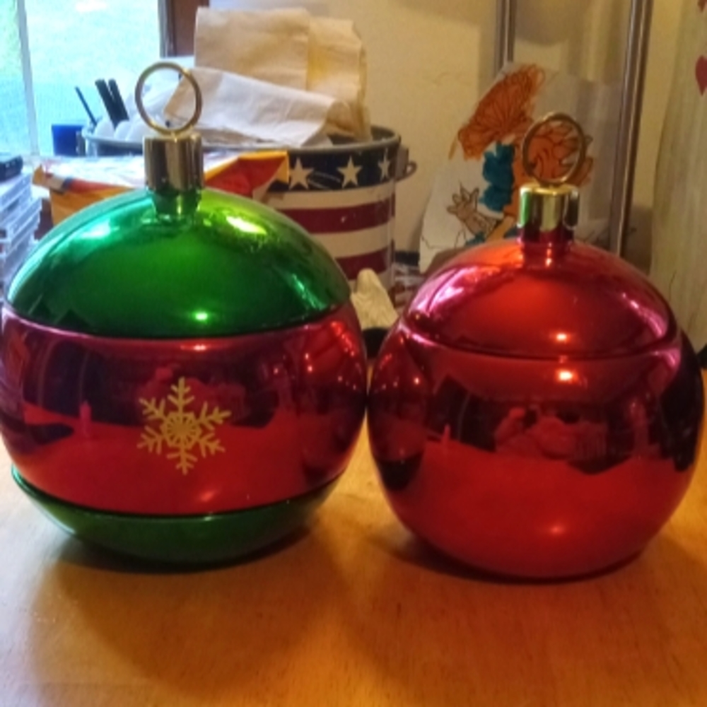 two christmas cookie jars or candy bowls